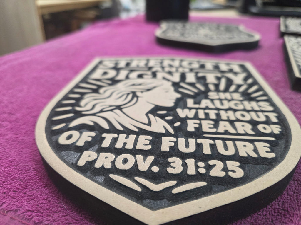 Proverbs 31:25 Strength and Dignity Wood Carving – 8" Wall Plaque